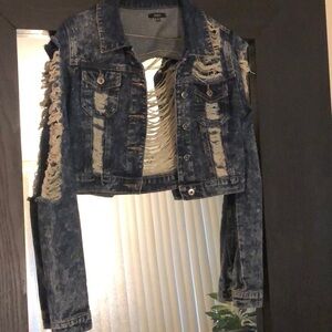 Distressed Jean Jacket. Size small in juniors